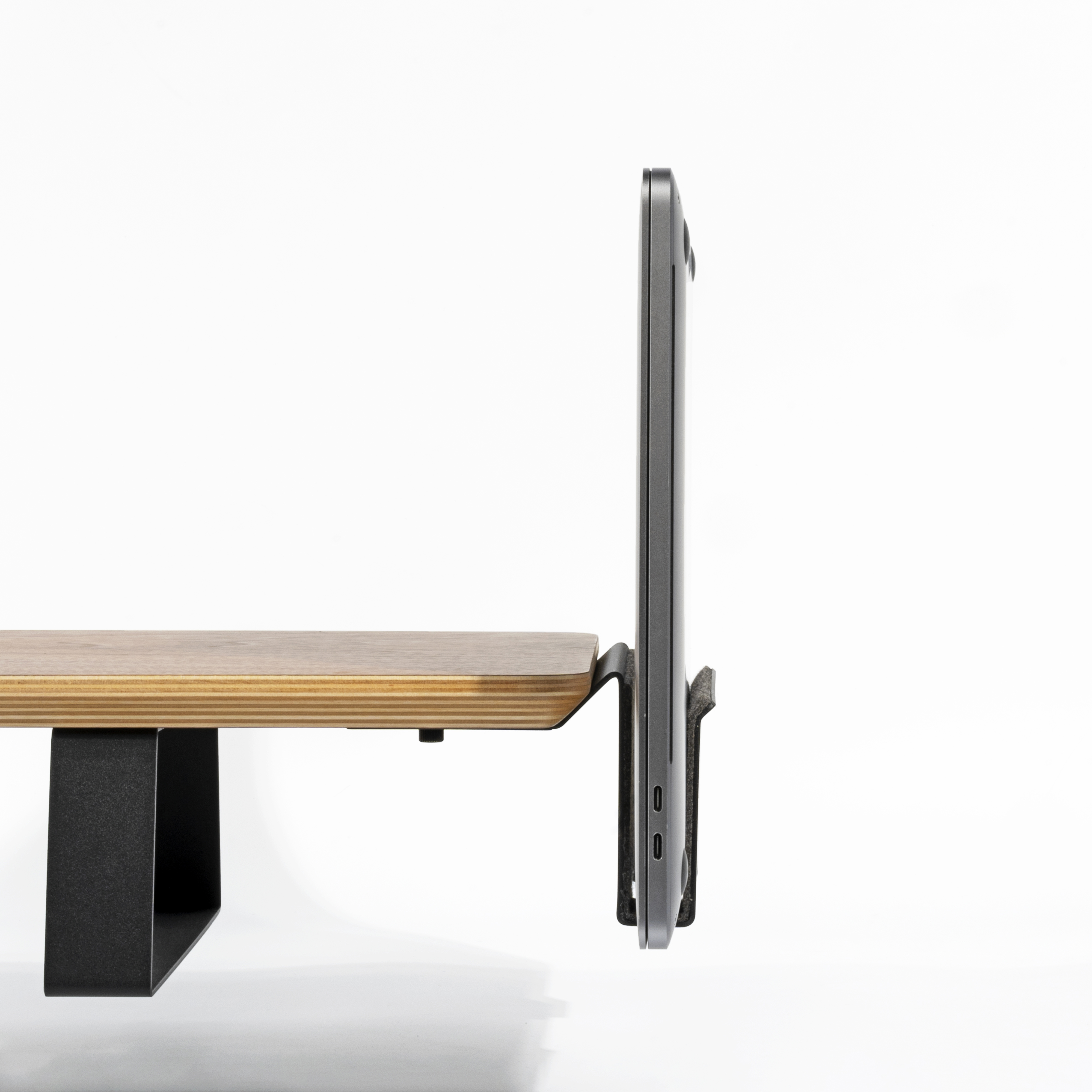Wooden laptop stand usage