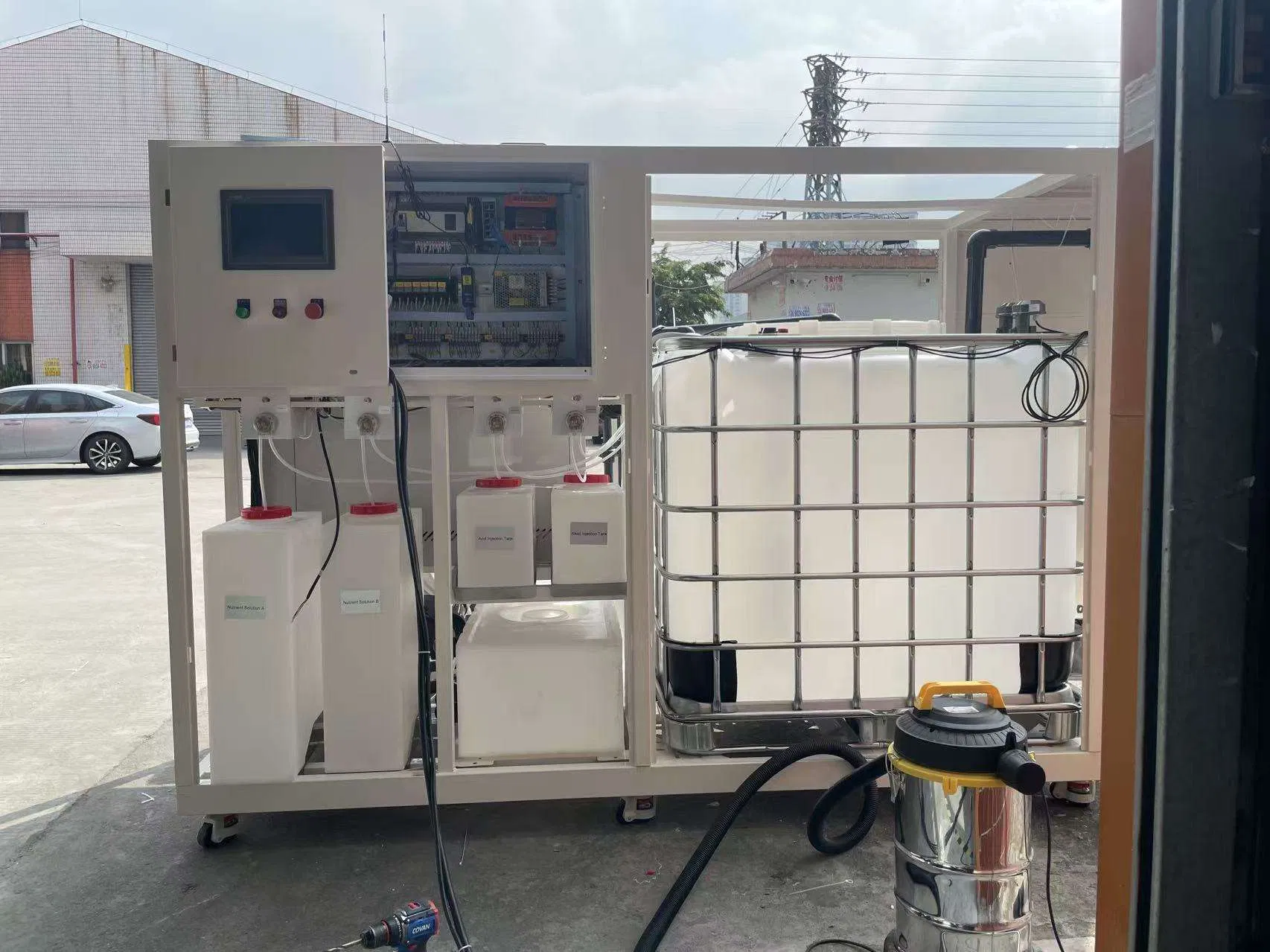 Automatic Nutrient Dosing Irrigation System for Indoor Vertical Farm