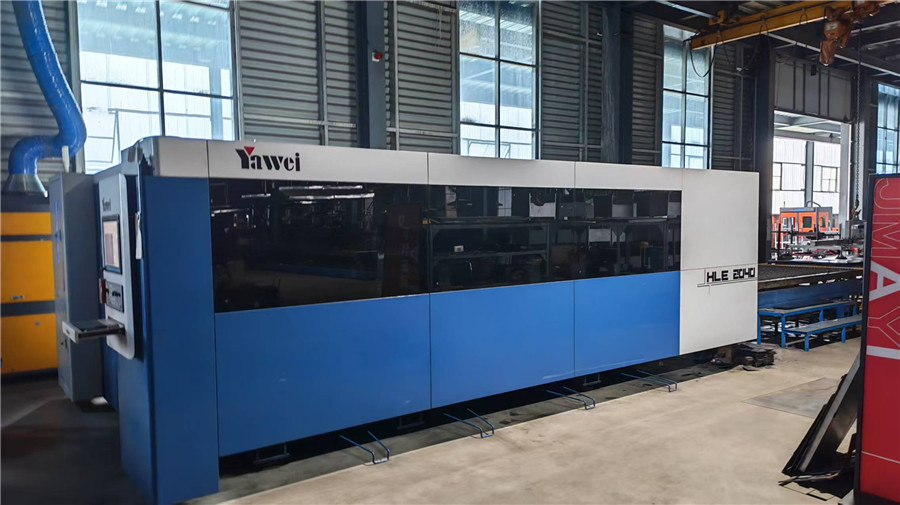 Laser cutting machine precisely cutting e-bike frame components at Tianjin Evergreen factory