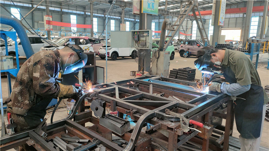 Precision MIG welding of e-bike frame at Tianjin Evergreen manufacturing plant