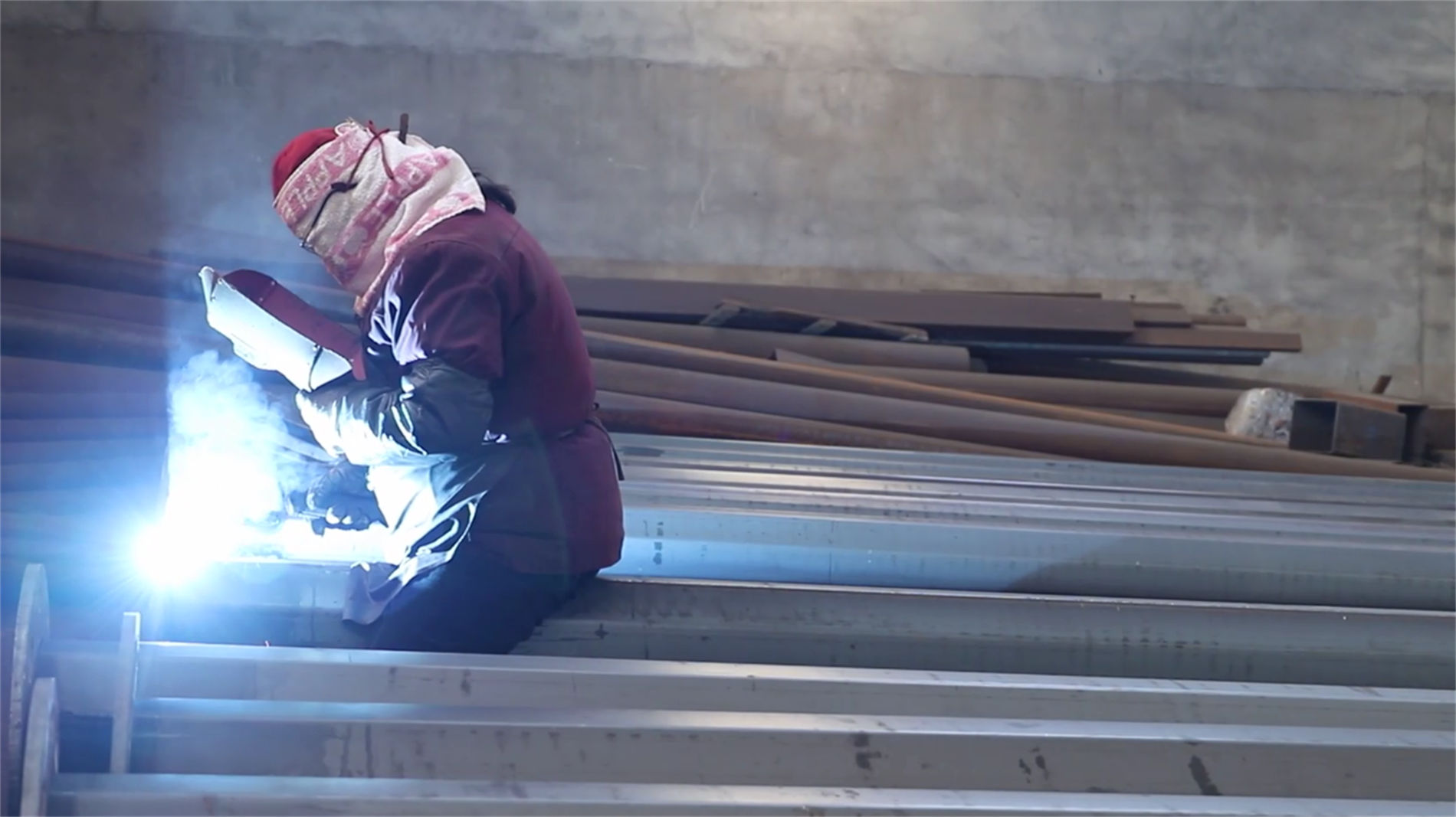 Automatic submerged arc welding of lighting pole components at Gtron Solar factory