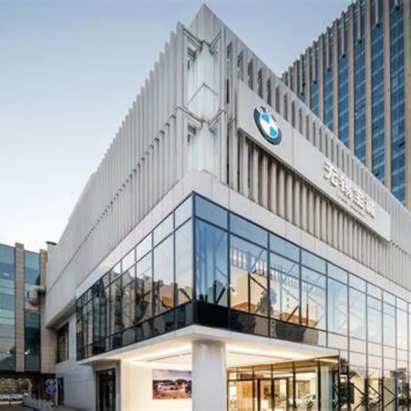 Automotive showroom glass application — BMW 4S shop using Guoxin reflective glass