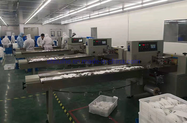 Gauze Bandage Surgical Face Mask Disposable Glove Flow Packing Machine for Packaging Plastic Cutlery Spoon Slipper Sponge