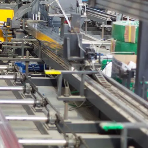 Production facility and roll forming process