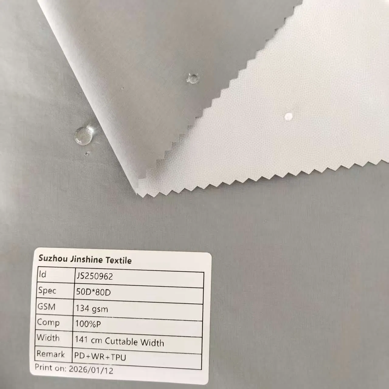 Packable Weather-Resistant Shell Fabric with TPU Backing, 50d80d Durable for Travel Raincoats and Foldable Outdoor Gear