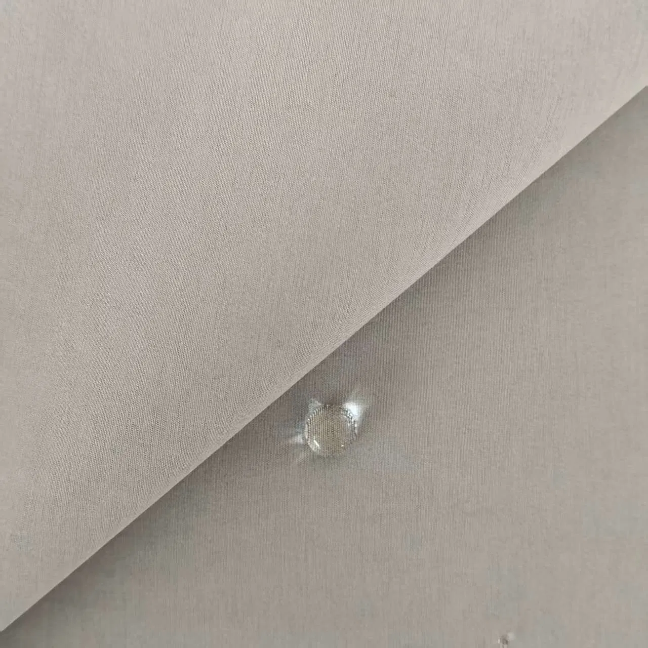 Packable Weather-Resistant Shell Fabric with TPU Backing, 50d80d Durable for Travel Raincoats and Foldable Outdoor Gear