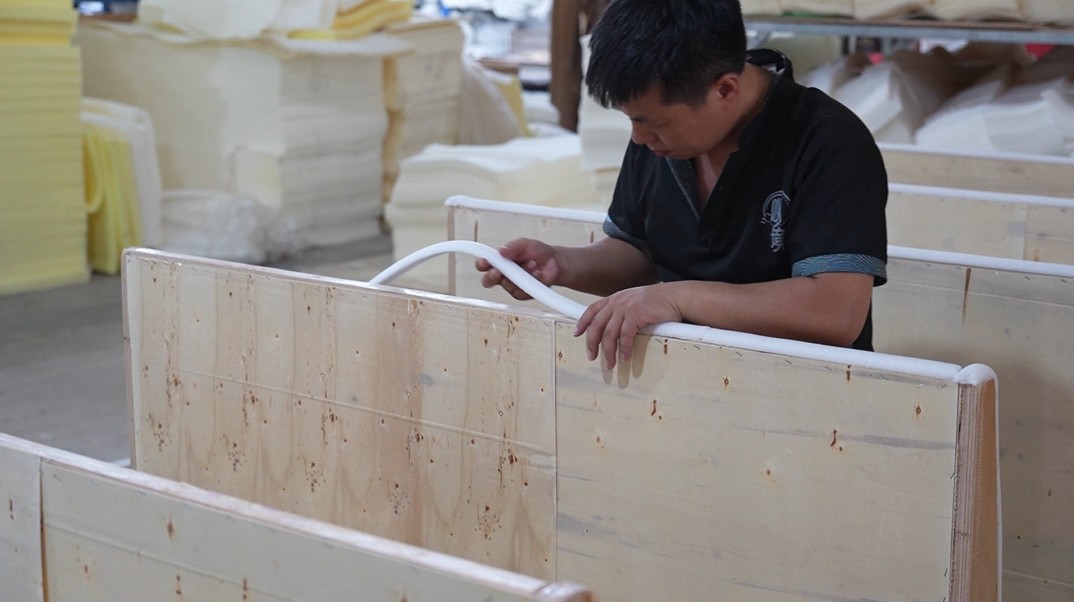 Furniture frame assembling step at Hark Homes production line