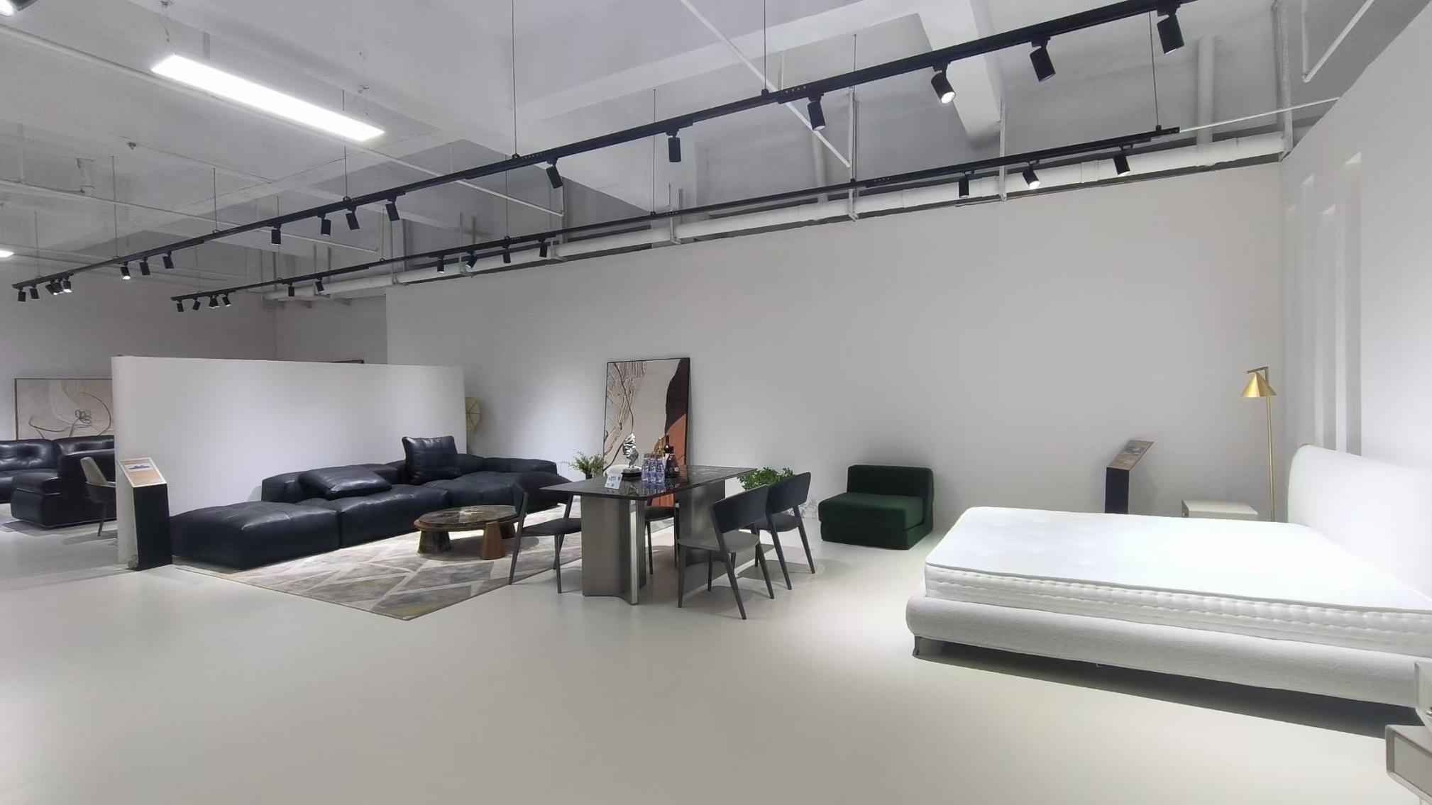 Shunde Hark Homes furniture factory interior showing production workflow