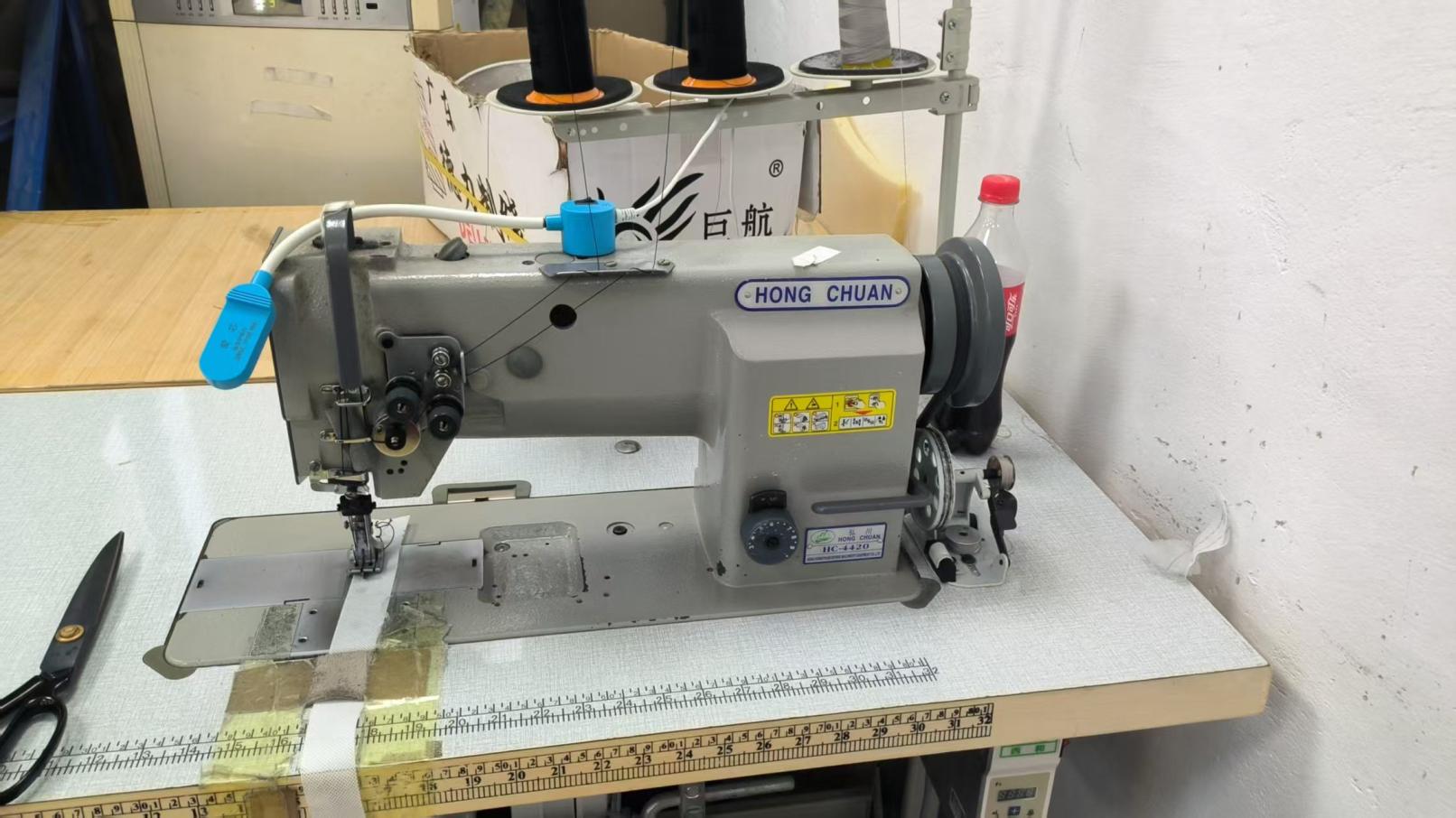 Industrial sewing machine for upholstered furniture at Hark Homes
