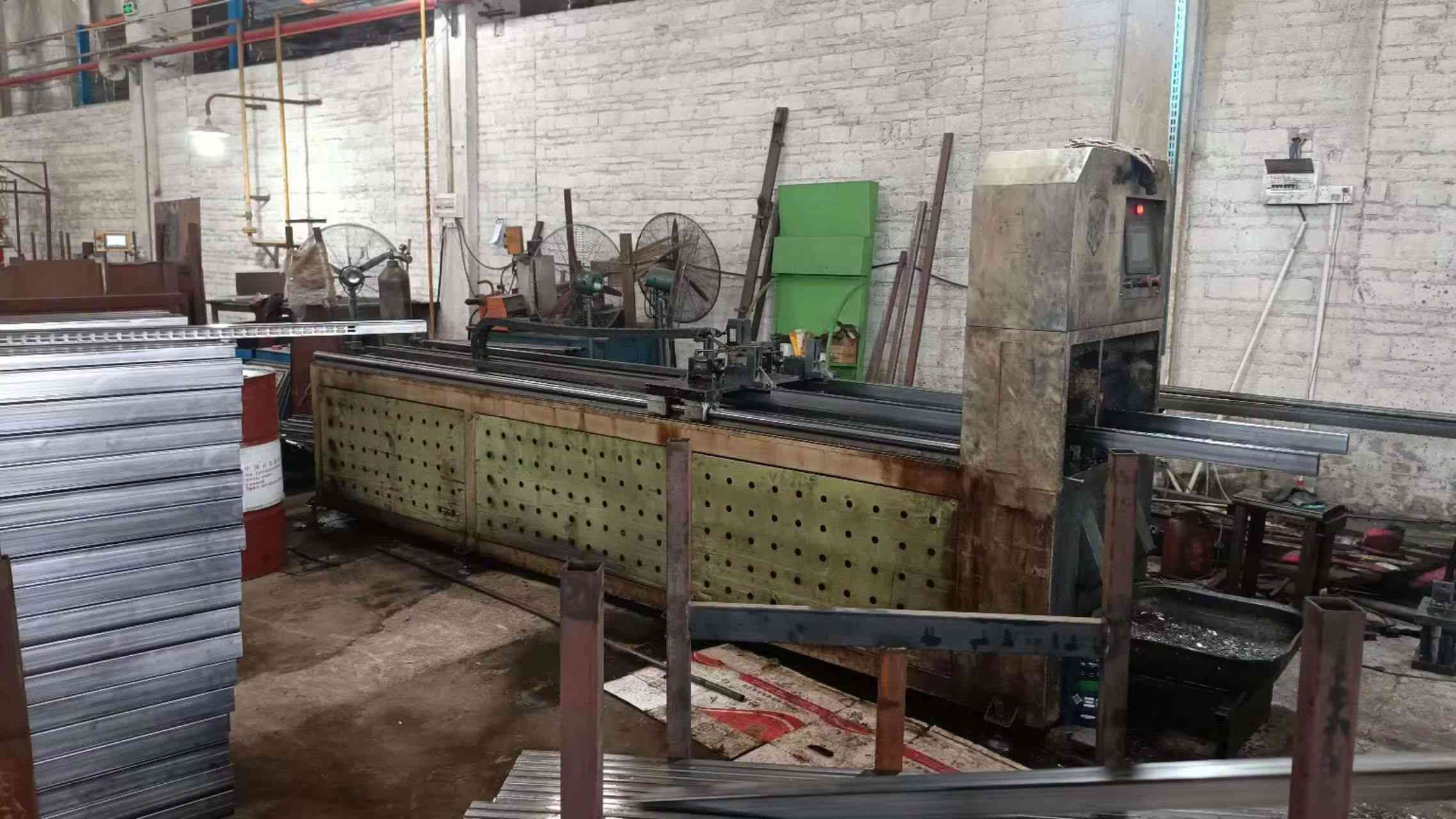 Fully automatic CNC punching machine for racking hole patterns