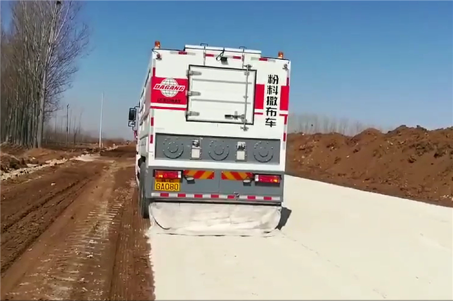 Cement spreader machine side view