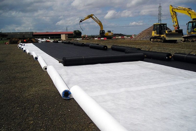 Warp knitted composite geotextile installed on site
