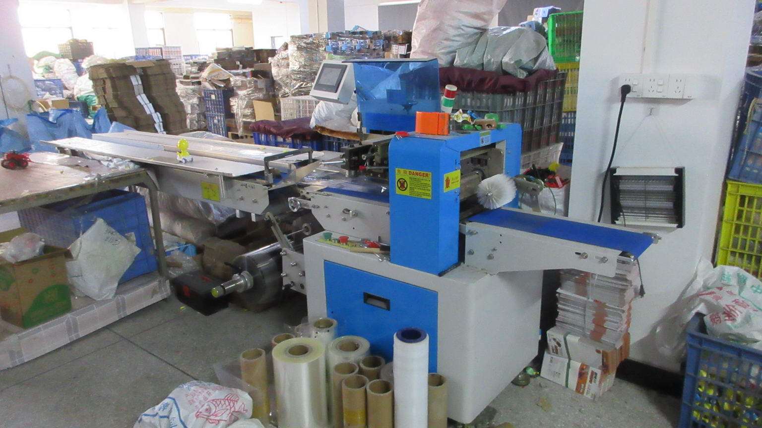 Automatic packaging machine for efficient toy export packaging at Hoopla Toys