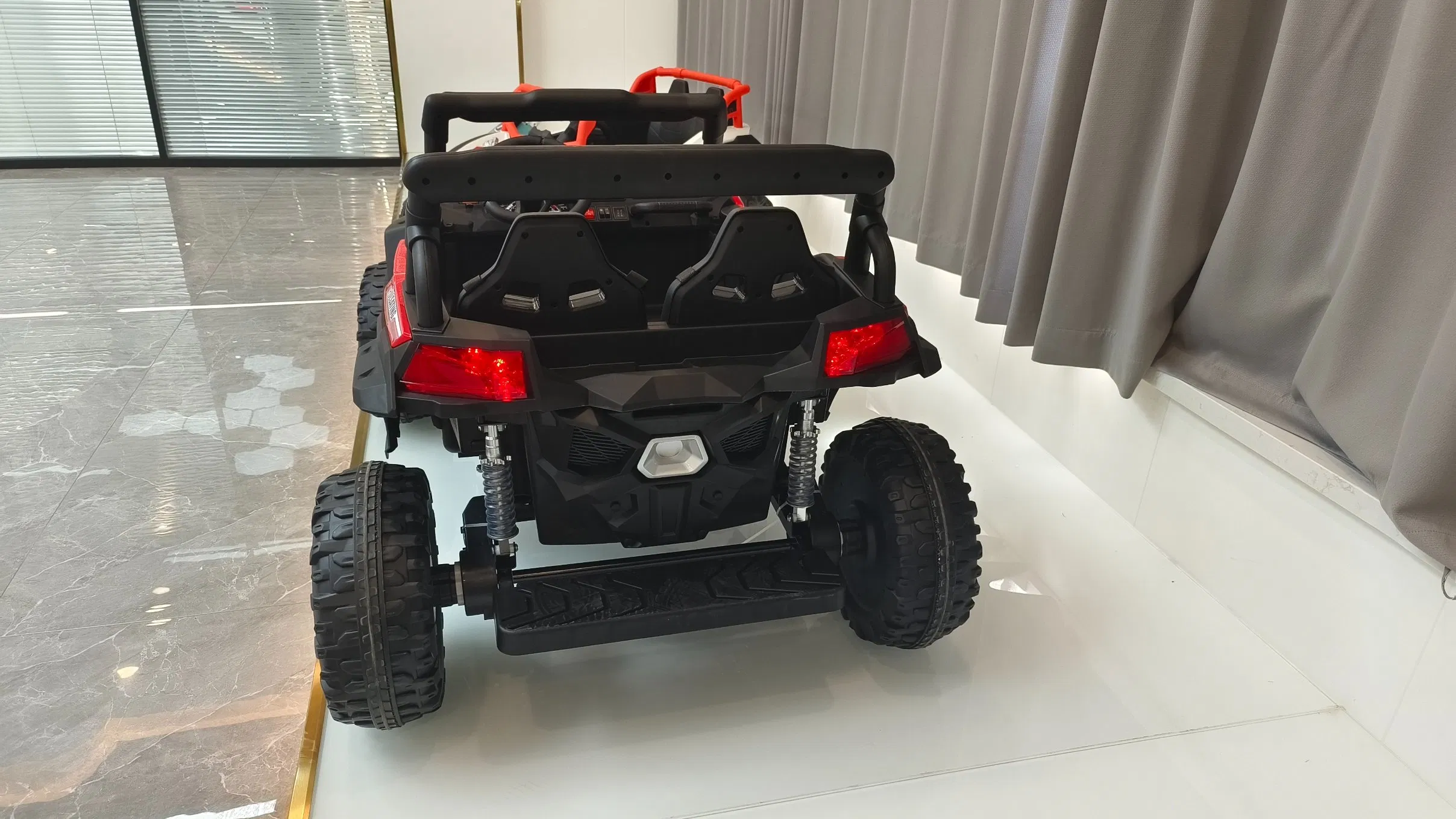 Factory Price Hot Selled Kids Electric Car Remote Control Sports Car with Four-Wheel Ride on Electric Car for Kids