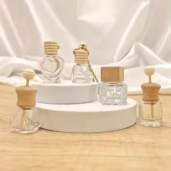 High-Quality Modern Interior Car Air Outlet Aromatherapy Essential Oil Holder Empty Glass Perfume Bottle and Air Conditioning Balm Ornament Manufacturer, Factories