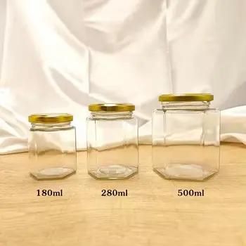 Cheap Mini Hexagon Glass Honey Jars 1.5 oz Party Favors with Dippers Lids for Jelly and Baby Food Suppliers, Manufacturer