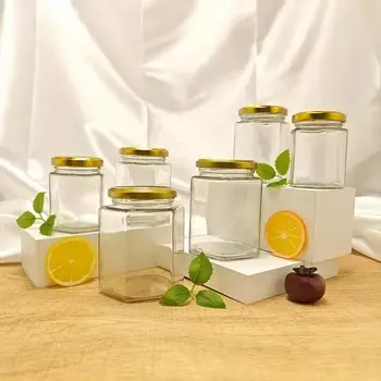 Cheap Mini Hexagon Glass Honey Jars 1.5 oz Party Favors with Dippers Lids for Jelly and Baby Food Suppliers, Manufacturer