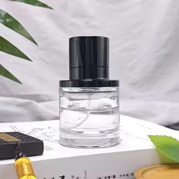 Cheap Round Perfume Bottle with a High End Magnetic Black Cap the First Choice for Understated Luxury Supplier, Manufacturers