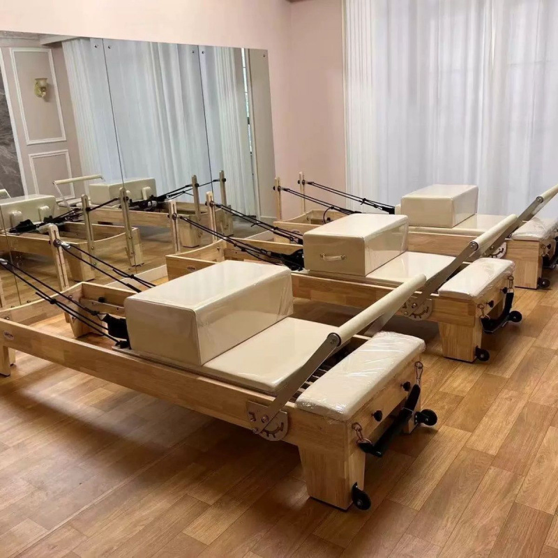 High Quality Custom Yoga &amp; Pilates Reformer Professional Fitness Training Machine Wood Stable Exercise Studio Equipment in a Box