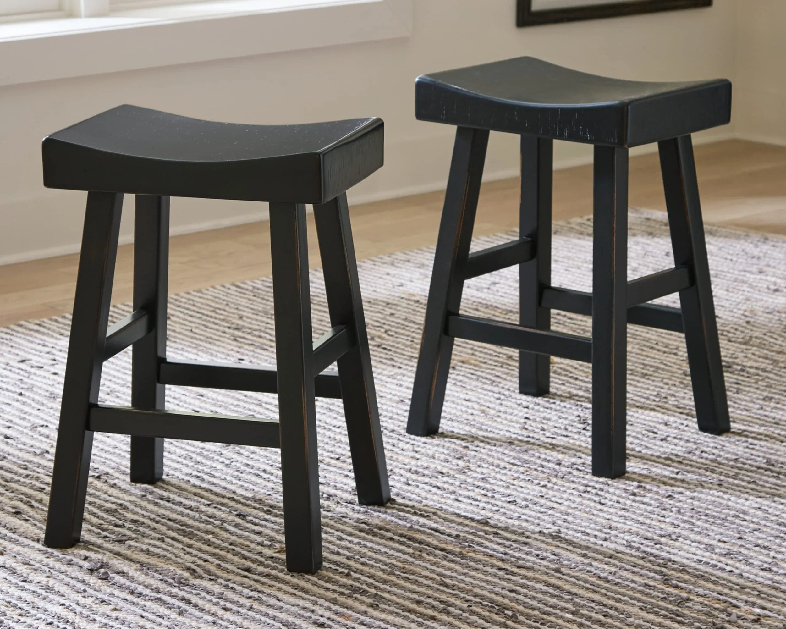 Design by Ashley Glosco Saddle Barstool