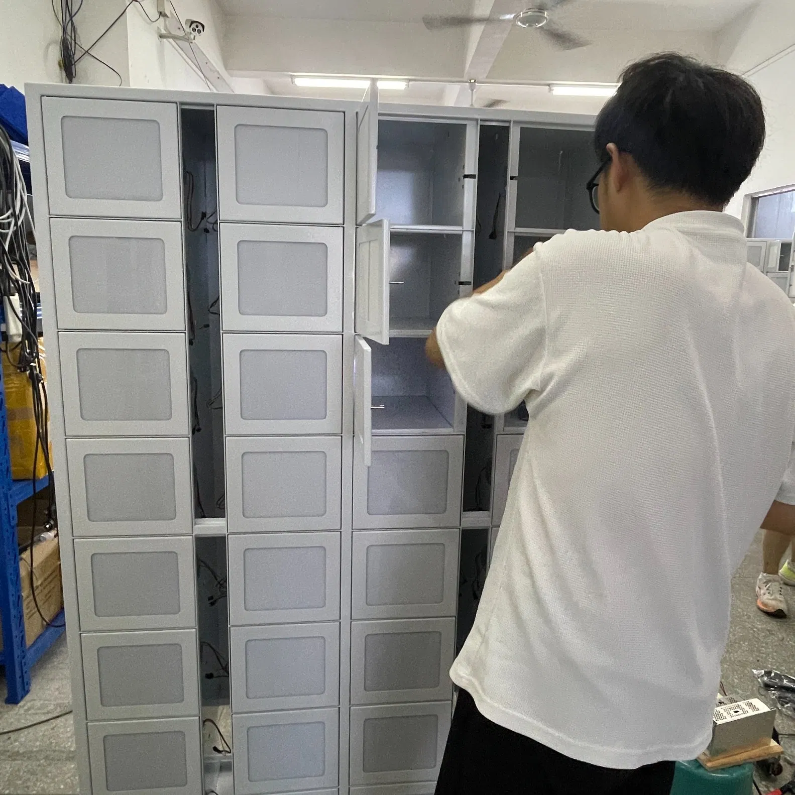 Facial Scan Grid Storage System Controls Vehicle Parts Inventory