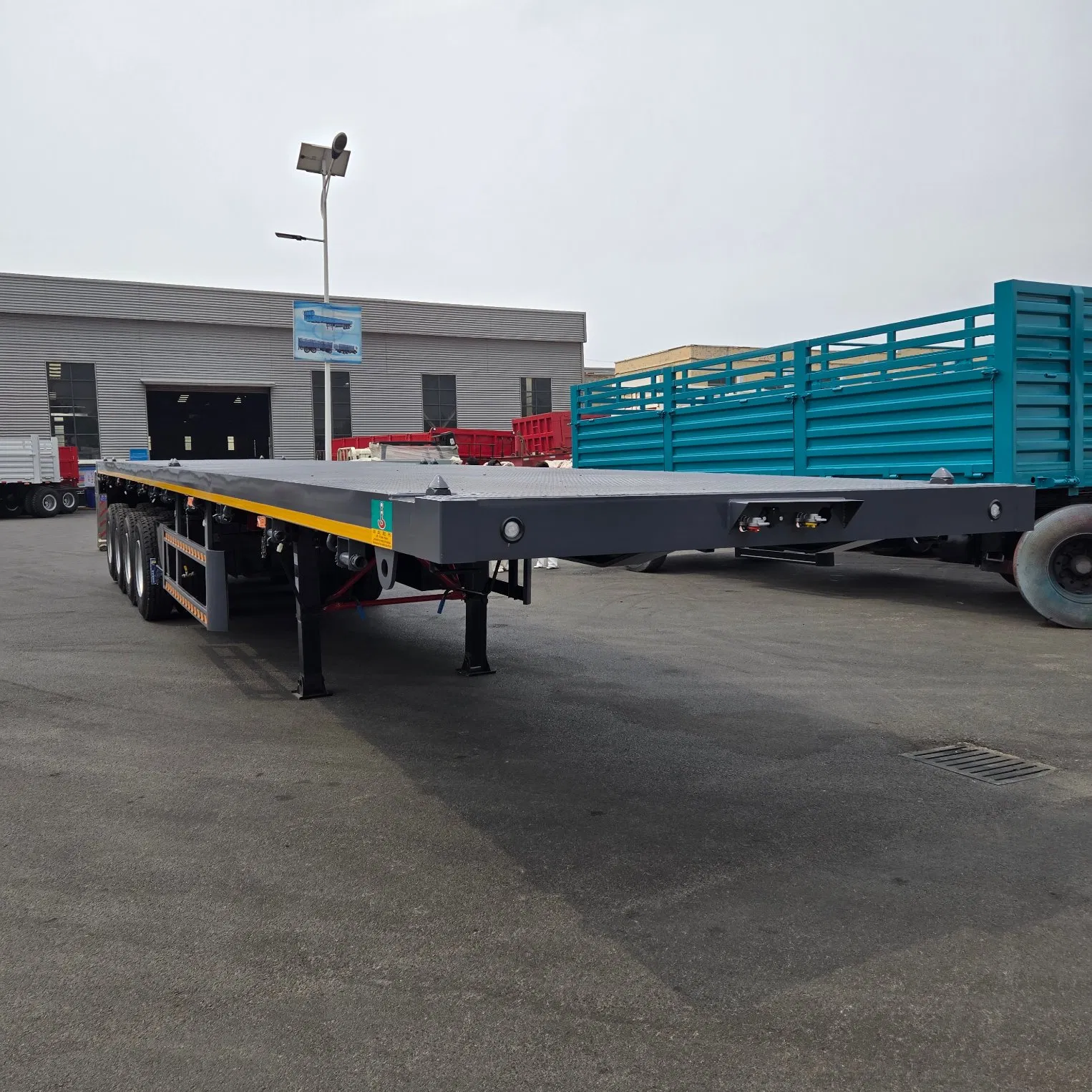 Hot Sale 4 Axle 40FT Container Flatbed Semi Trailer 80ton Capacity Truck Trailers New Price for Sale