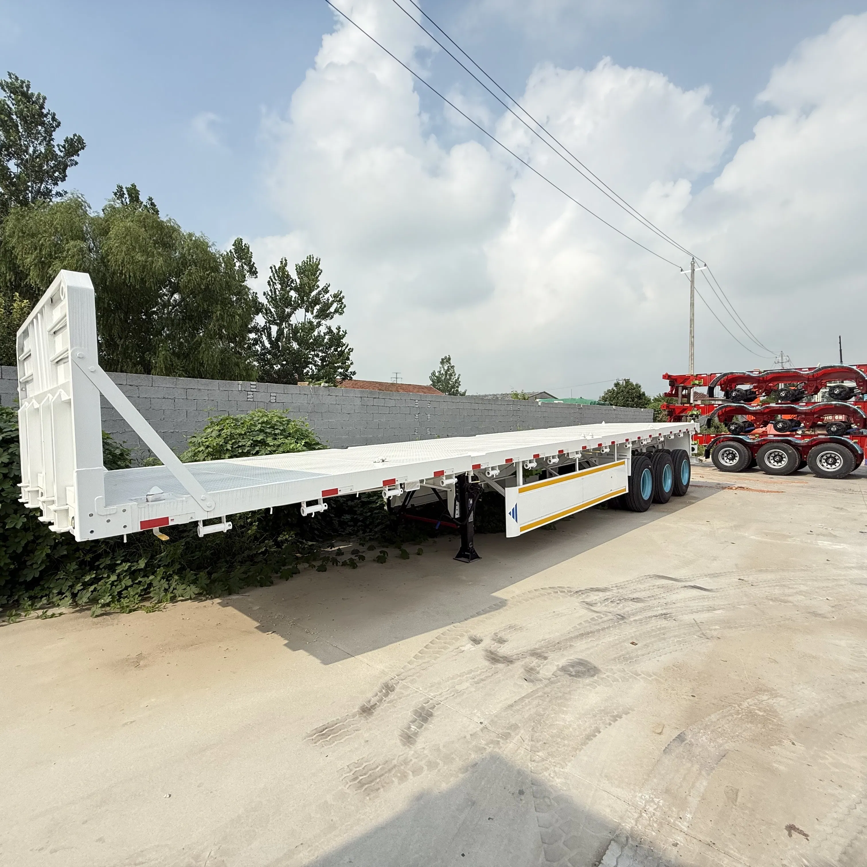 Sturdy Flatbed Semi-Trailer with Enhanced Load Capacity Features