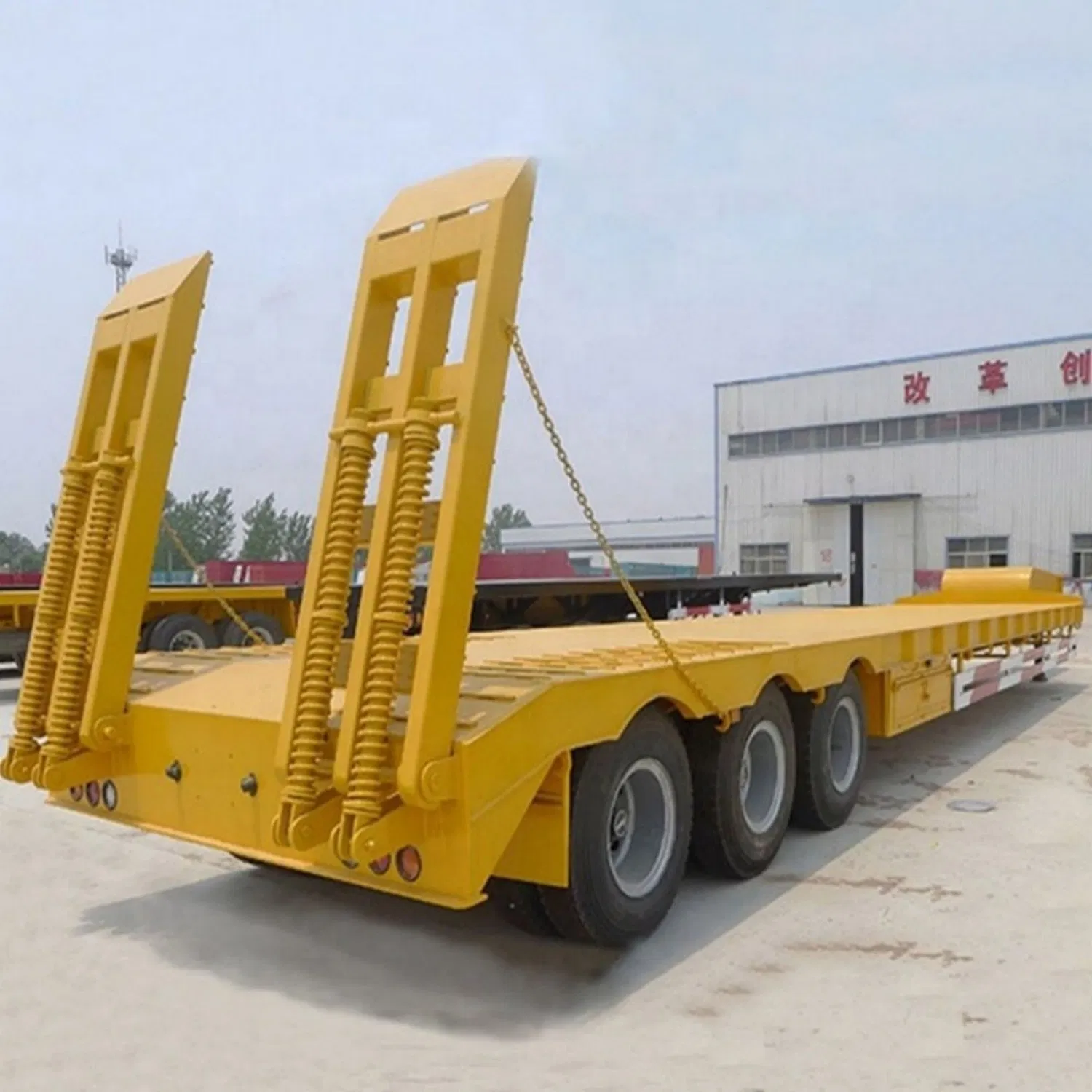 Low Bed Semi Trailer with Stand Column for Log or Coils Transportation