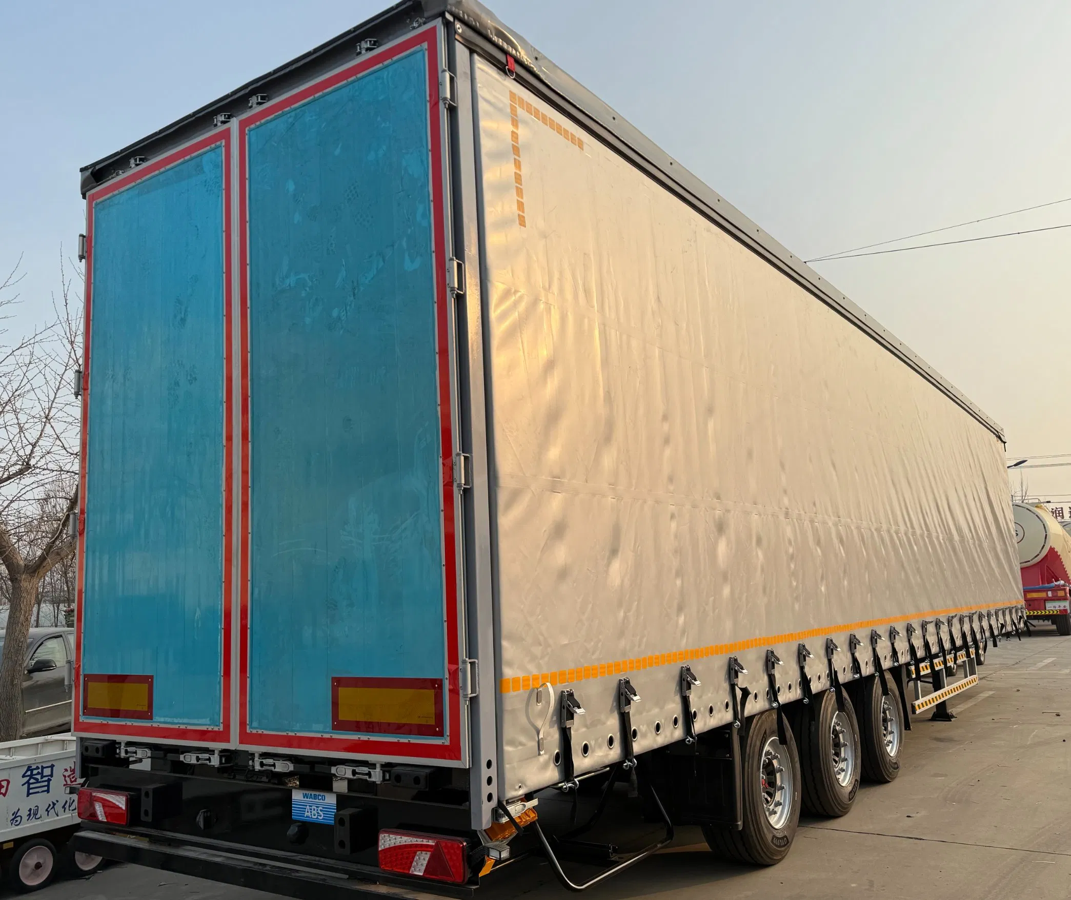 China Manufacturer 3axles 4axles 40ton 60ton 80ton 90cbm 110cbm 130cbm Cargo Transport Drop Side Curtain Canvas Box Van Semi Trailer