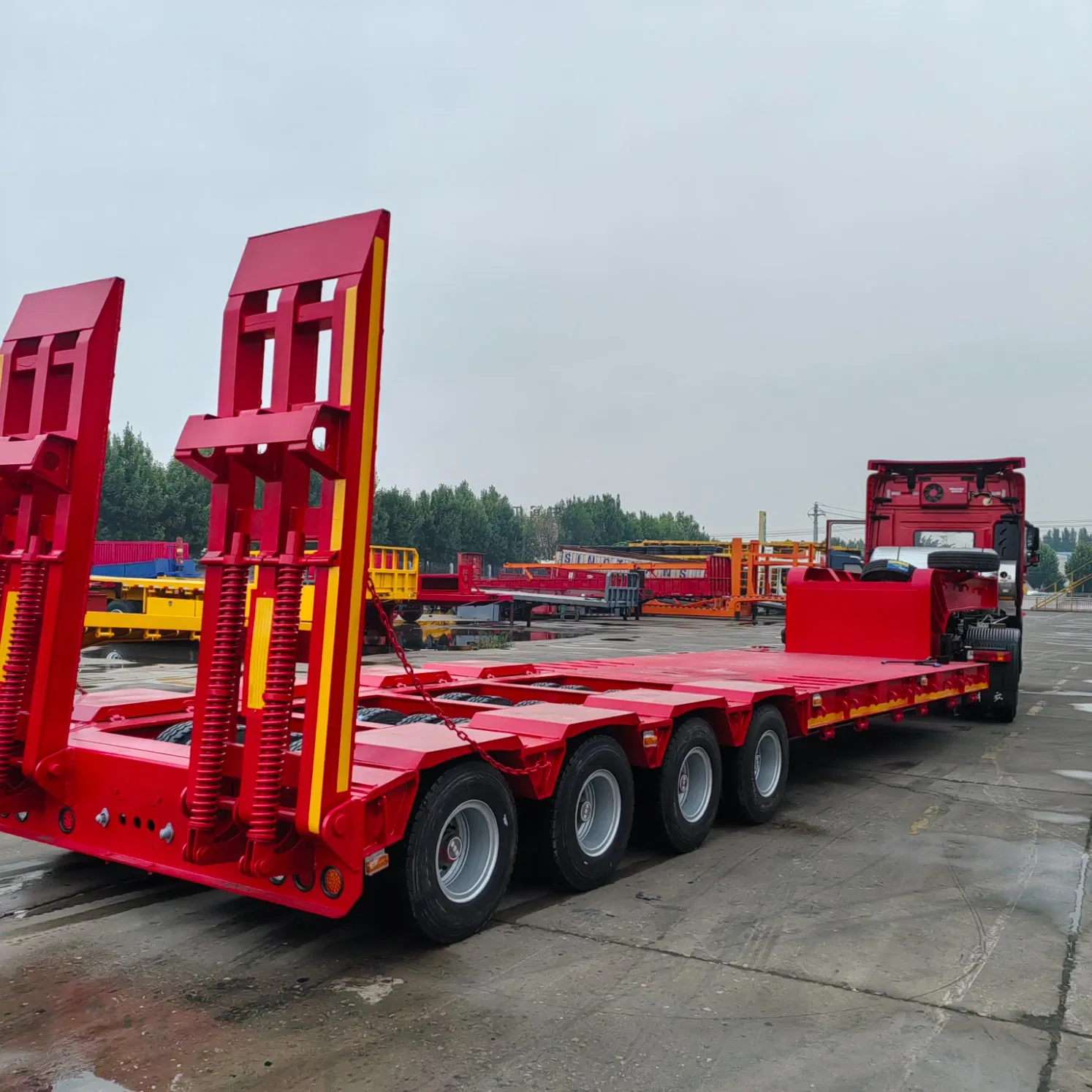 Flatbed Semi-Trailer 4 Axles Low Cargo Platform Small Tire Trailer Excavator Transport Vehicle