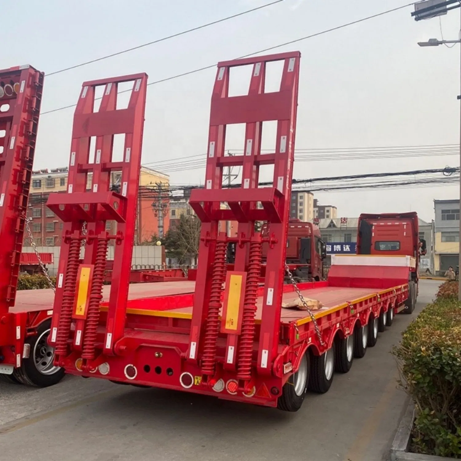 Low Bed Semi Trailer with Stand Column for Log or Coils Transportation