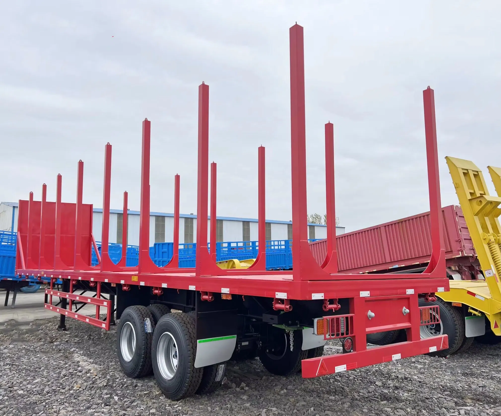 3 Axle Flatbed Chassis with Stake Original Forest Timber Log Wood Transport Truck Semi Trailer