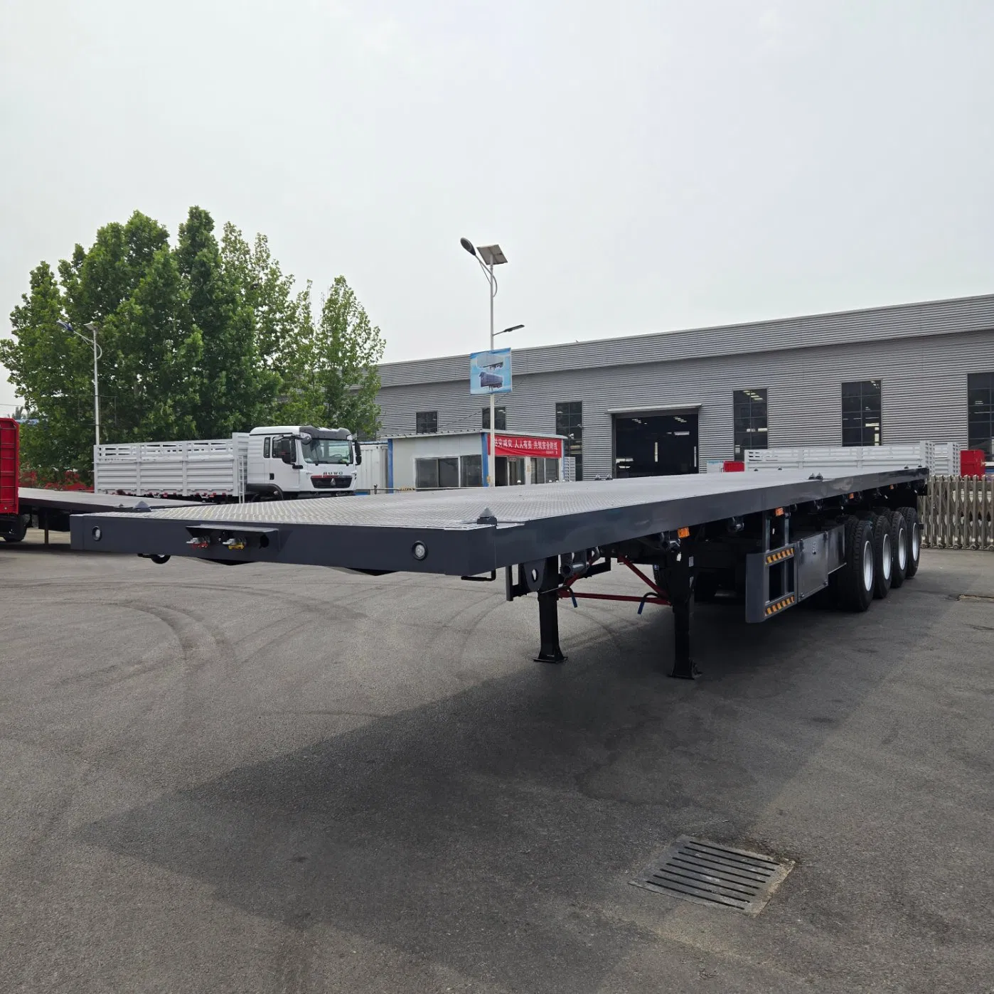 Hot Sale 4 Axle 40FT Container Flatbed Semi Trailer 80ton Capacity Truck Trailers New Price for Sale