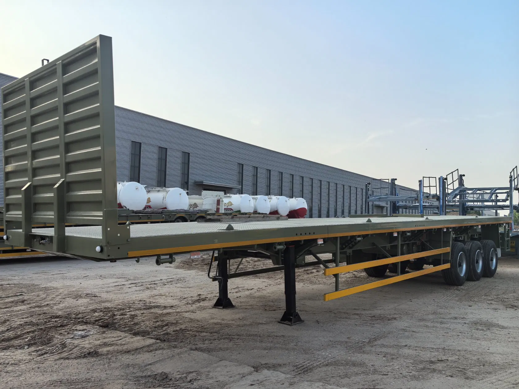 China Longyang Brand 3axles 60 Tons 20/40 Foot FT Container Shipping Flat Deck High Bed Platform Triaxle Flatbed Freight Truck Semi Trailer for Sale Price