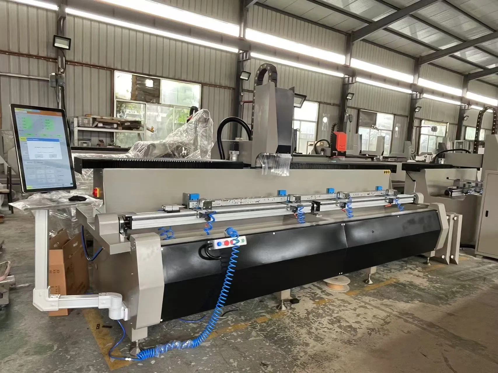 Double-Head CNC Machining Center for Aluminum Profile Milling and Drilling with Patents and CE