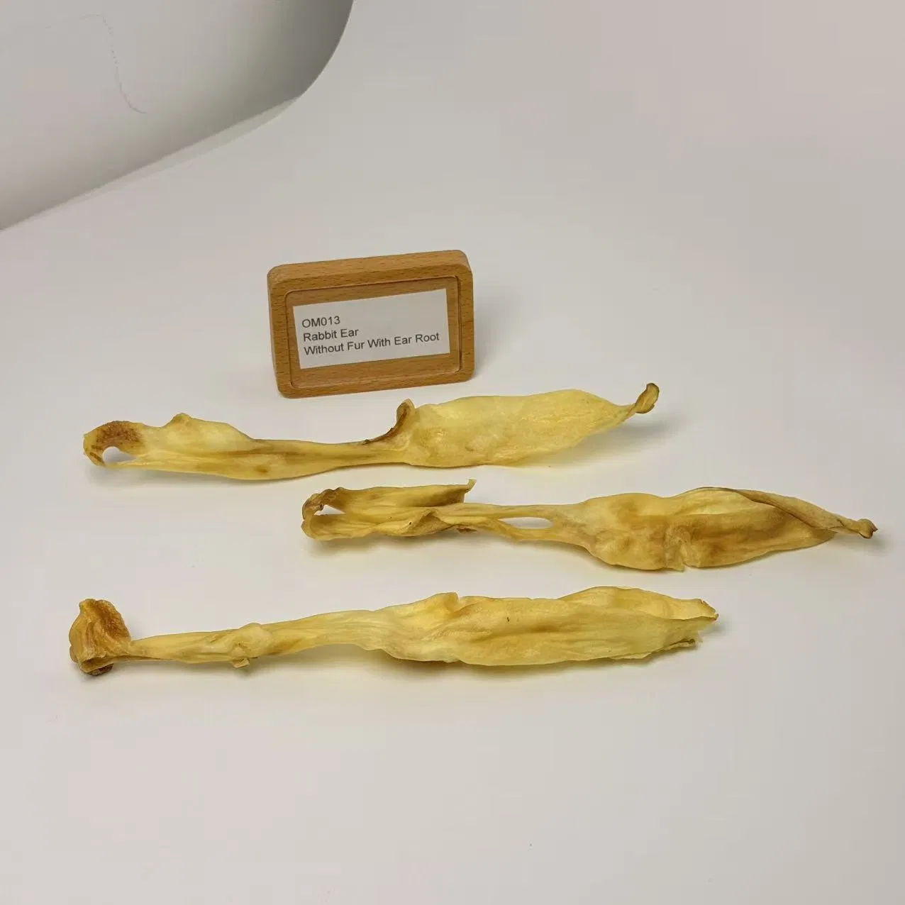 Oreja de conejo pura sin pelo con raíz de oreja, snack para mascotas nutritivo y alto en proteínas