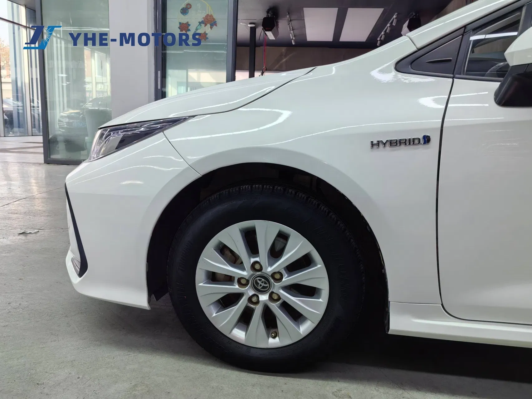 Vehículo familiar compacto eléctrico híbrido Toyota Corolla a precio de fábrica, venta caliente de coche eléctrico usado