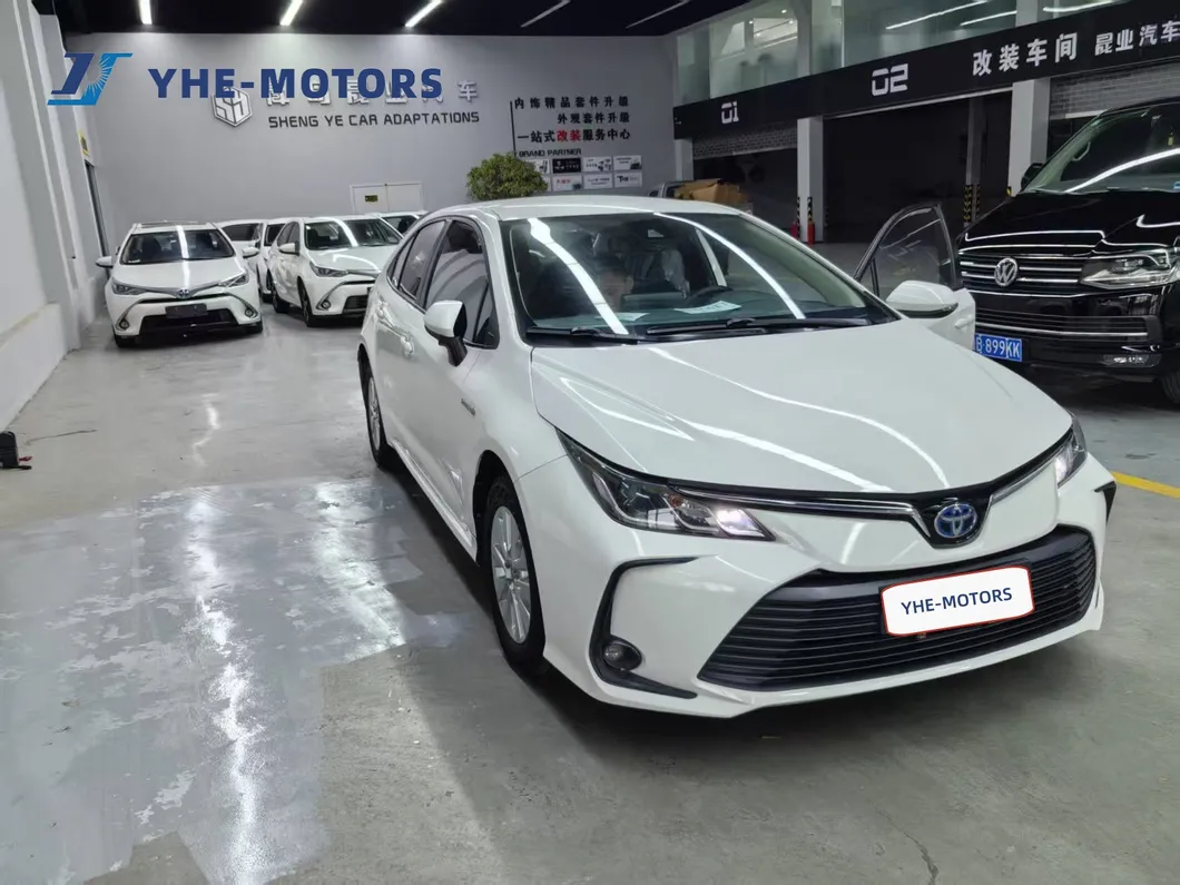 Vehículo familiar compacto eléctrico híbrido Toyota Corolla a precio de fábrica, venta caliente de coche eléctrico usado