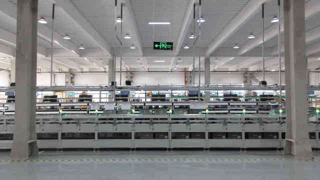 NovaBot AI floor scrubber robot navigating commercial environment autonomously