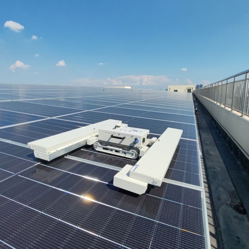 Terrain-Adaptive Solar Panel PV Trackless Cleaning Roller Brush Robot