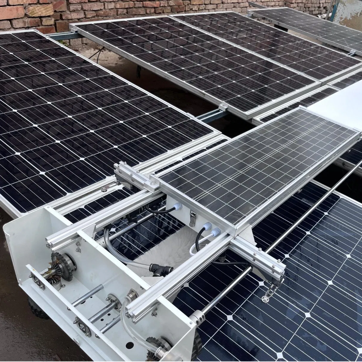 Smart Dual-Use Cleaning Robot for Wet and Dry Solar Panels