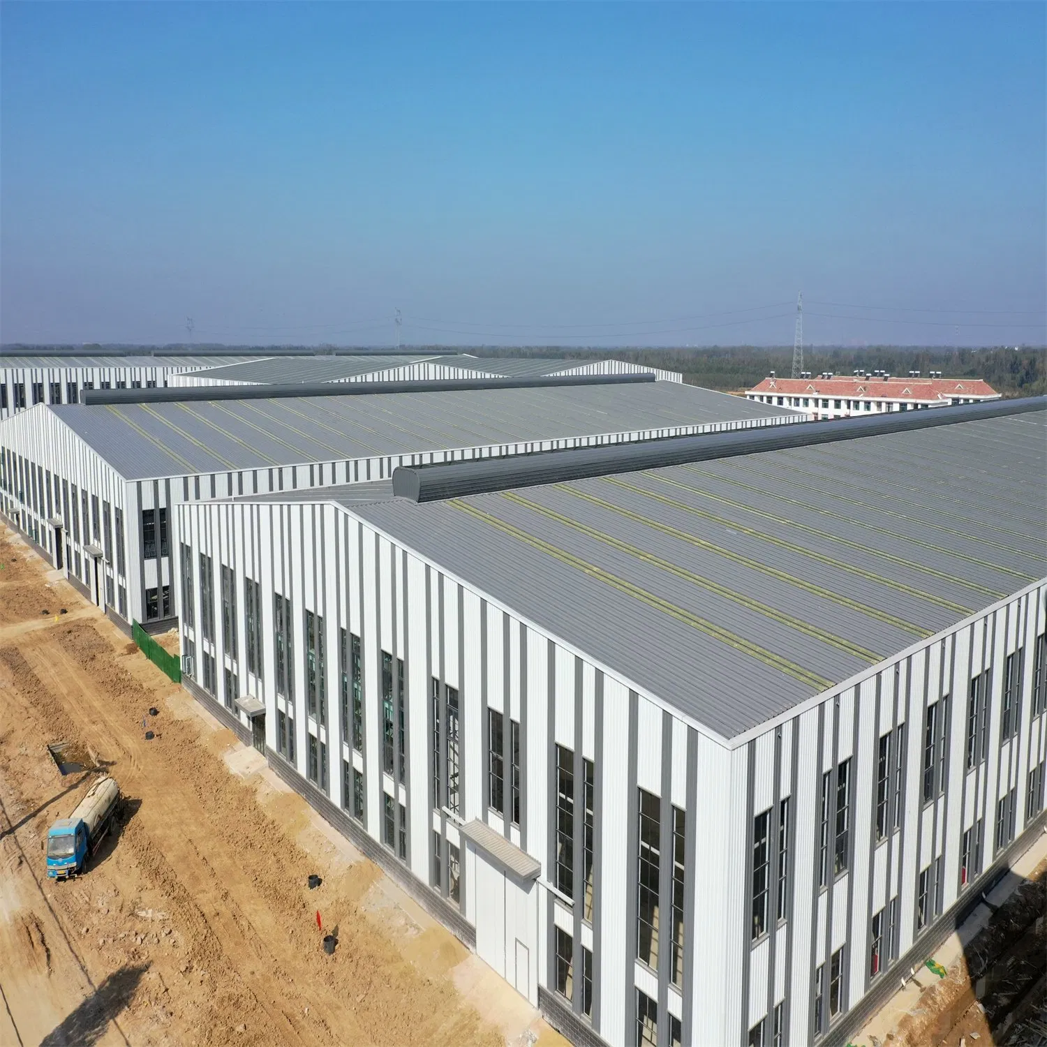 Construção de Edifícios em Estrutura de Aço Armazém Prefabricado Oficina Industrial Fabricada Escritório Prefabricado Galpão de Metal para Armazenamento