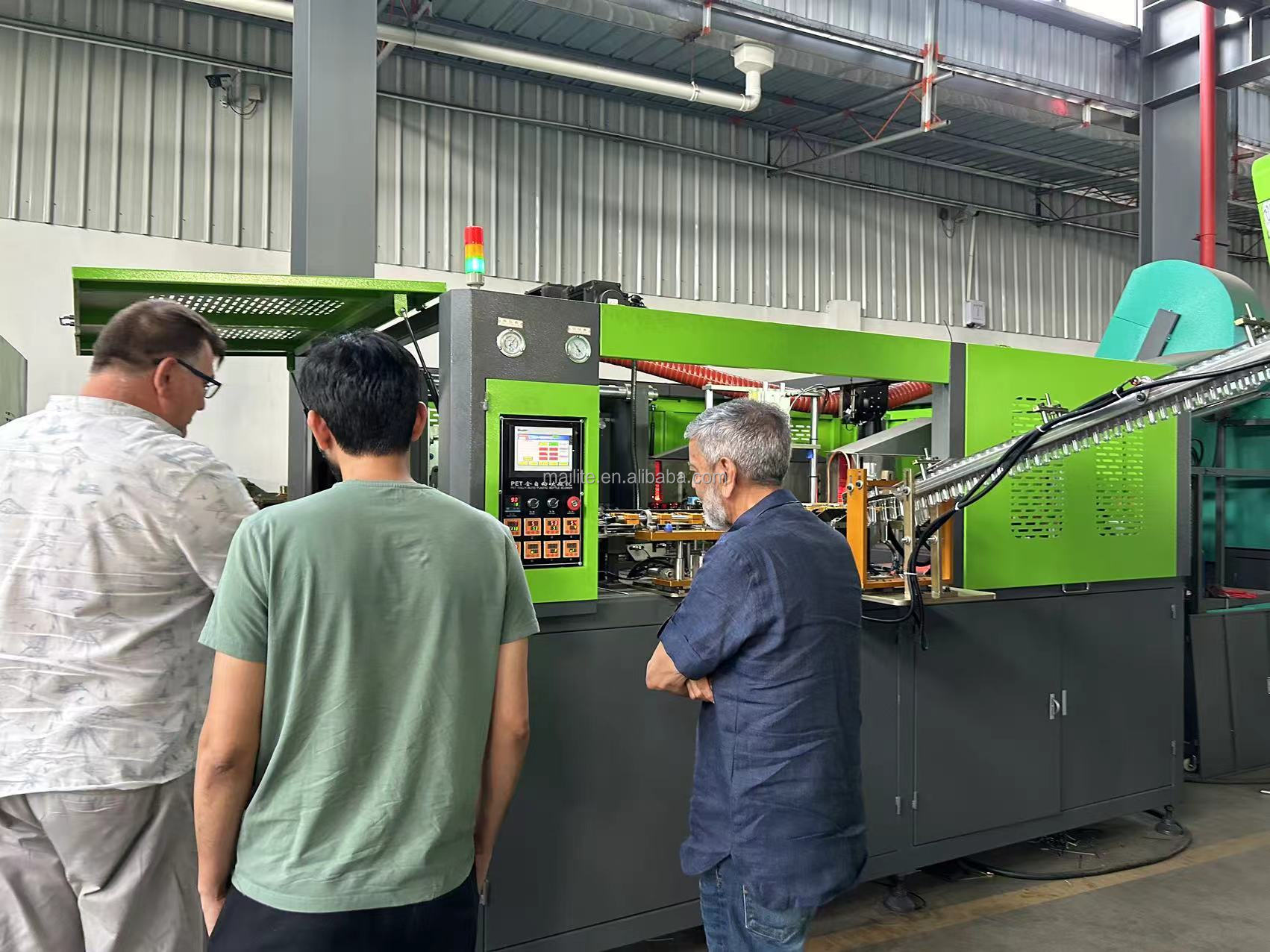 Bottle blowing machine