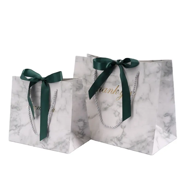 Customized Marble Clothing Shopping Paper Bag for Gifts Birthday Party Favors Wedding Ribbon Gift Packaging Bags with Handle Manufacturer, Manufacturers