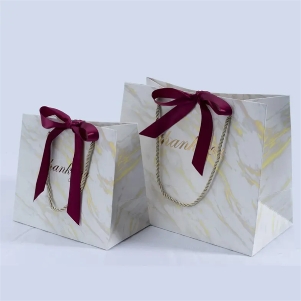 Customized Marble Clothing Shopping Paper Bag for Gifts Birthday Party Favors Wedding Ribbon Gift Packaging Bags with Handle Manufacturer, Manufacturers