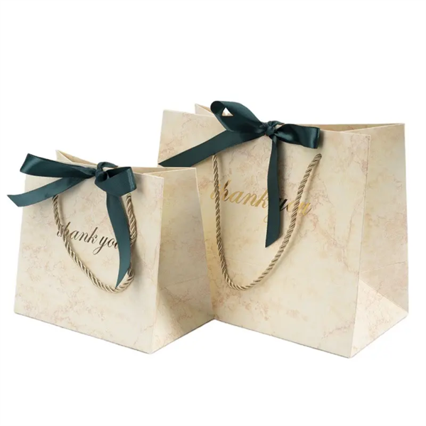 Customized Marble Clothing Shopping Paper Bag for Gifts Birthday Party Favors Wedding Ribbon Gift Packaging Bags with Handle Manufacturer, Manufacturers