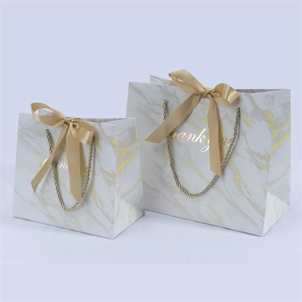Customized Marble Clothing Shopping Paper Bag for Gifts Birthday Party Favors Wedding Ribbon Gift Packaging Bags with Handle Manufacturer, Manufacturers