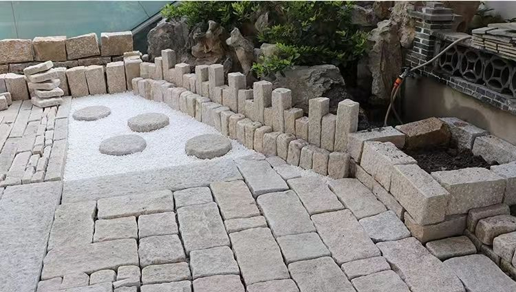 Natural Split and Tumbled China Gold Yellow Granite Cobblestone Paver Curved Walkway
