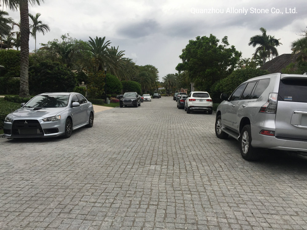 China Wholesale Cheap Natural Split Tumbledg603 Light Grey Granite Cobblestone Driveway Pavers Price