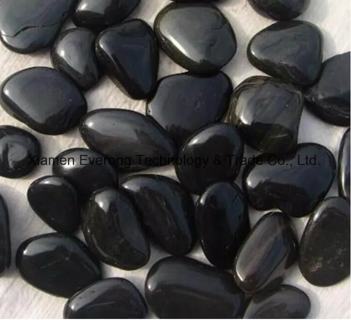 Black Oval Pebbles Polished Surface